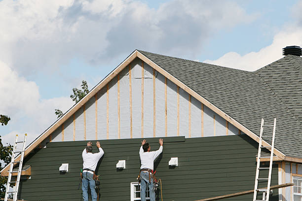 Professional Siding technician working in East Boston, MA